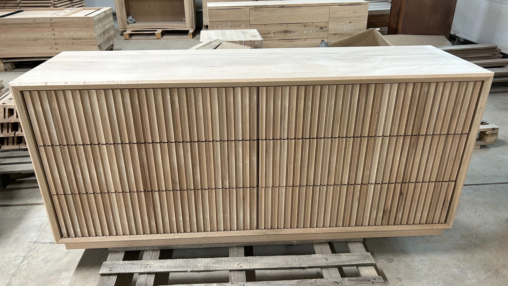 Fluted solid oak cabinet in production, showing custom wood project execution
