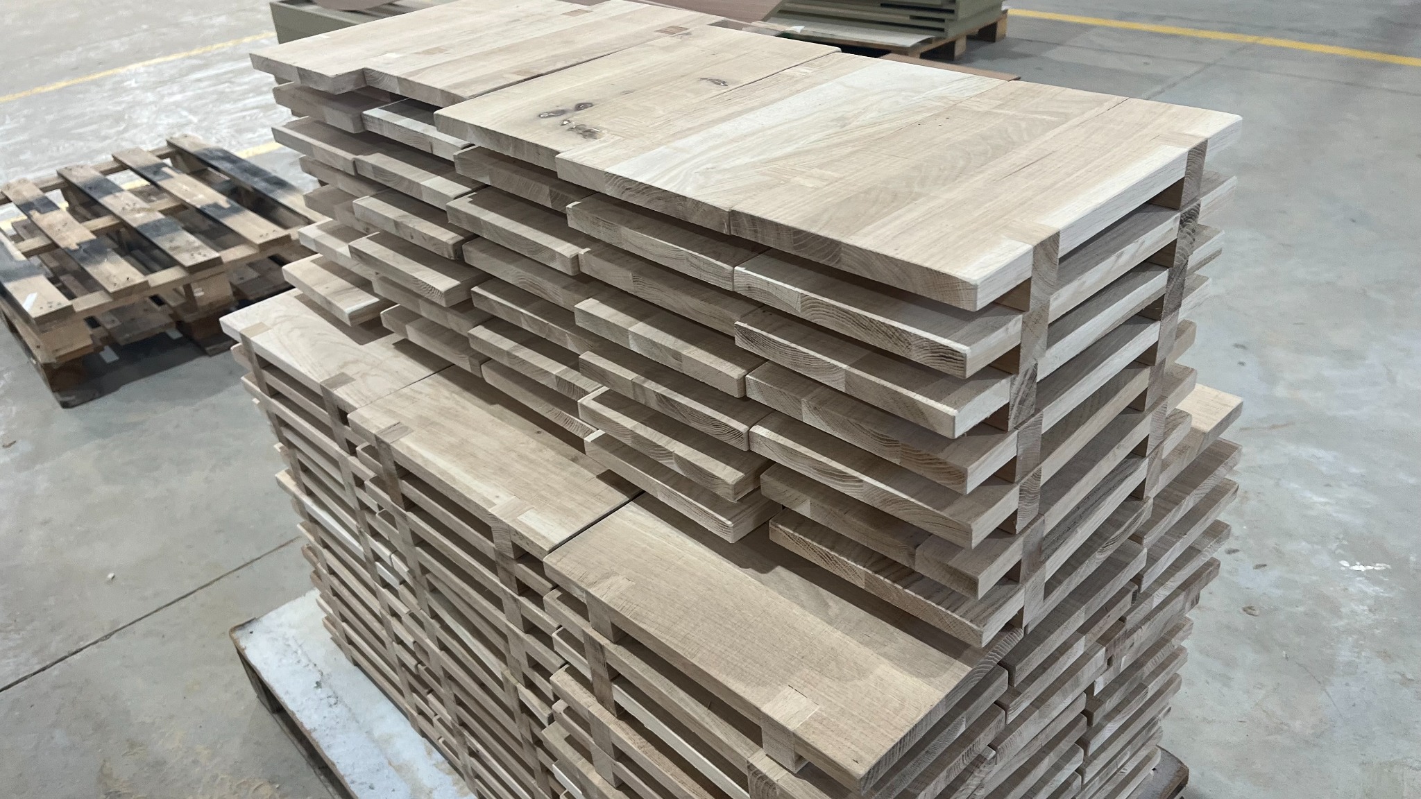 Solid oak furniture components prepared for custom production and project coordination