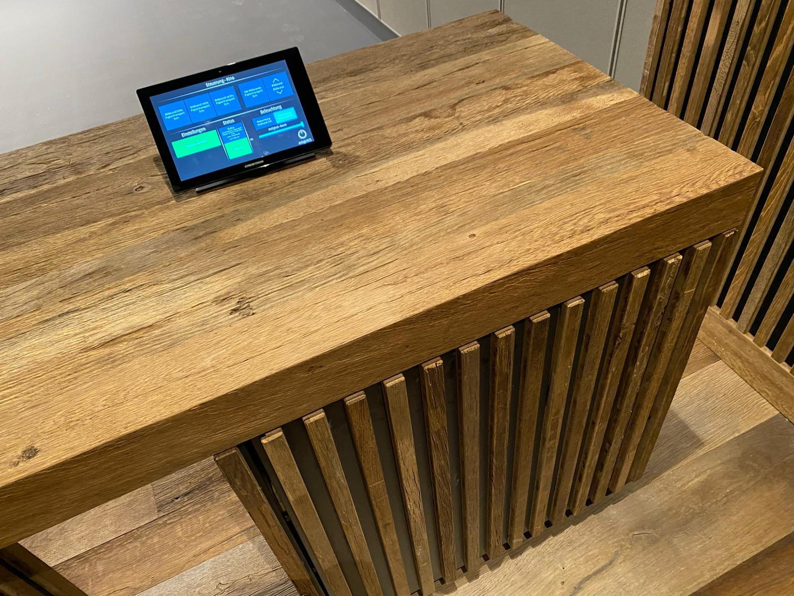 Reclaimed oak reception desk with original patina installed in commercial space